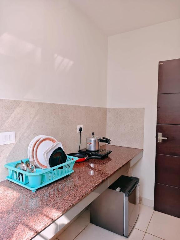 Kuchyň nebo kuchyňský kout v ubytování Nest Residency