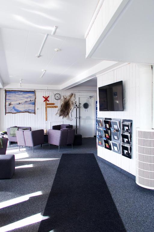 TV a/nebo společenská místnost v ubytování Hotel E-10 by First