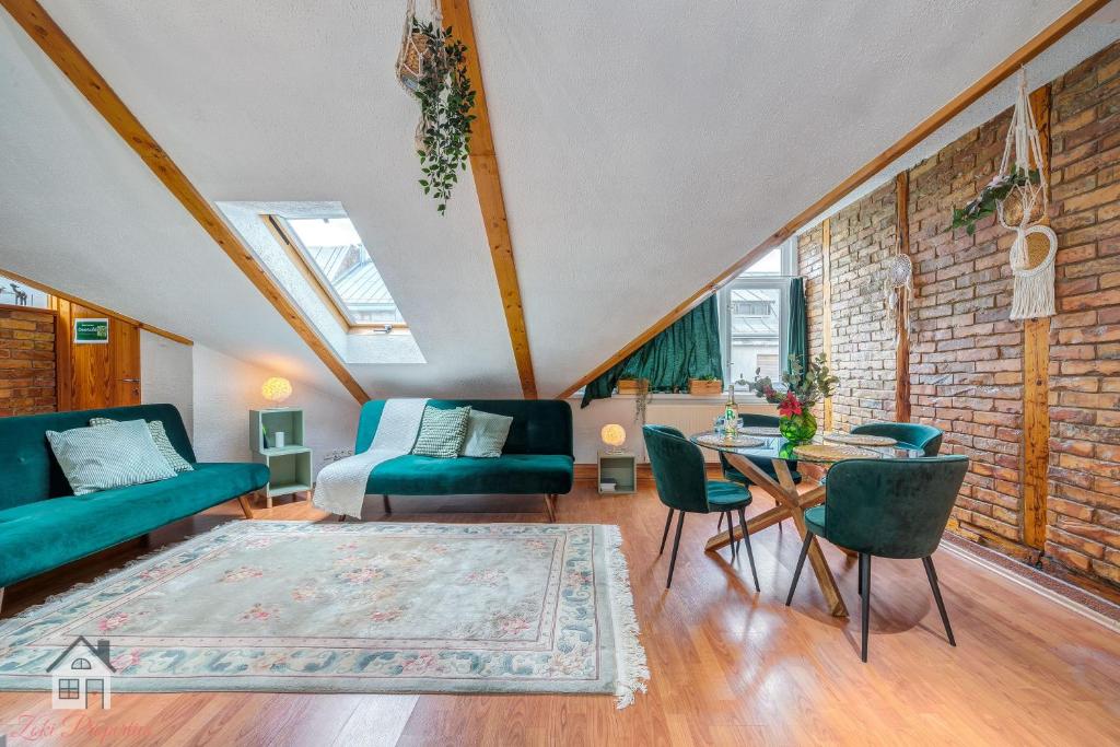 Posezení v ubytování ACME Apartments