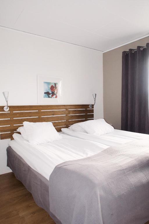 Postel nebo postele na pokoji v ubytování Hotel E-10 by First