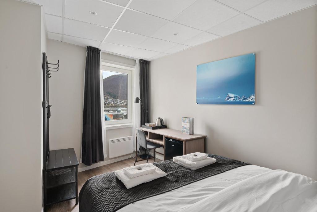 Enter Skansen Hotelにあるベッド