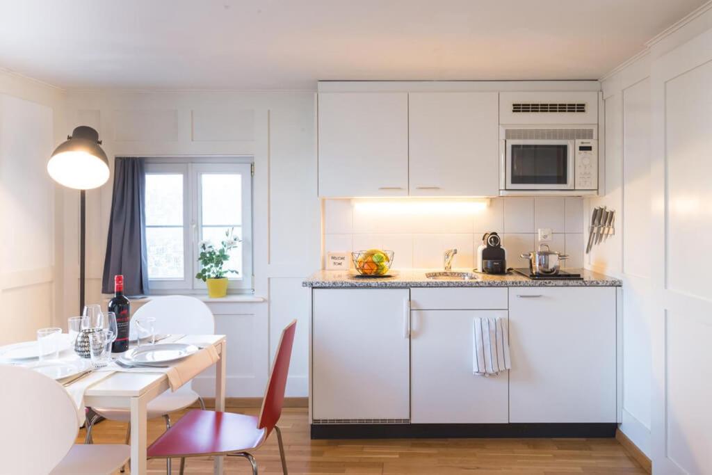 Kuchyň nebo kuchyňský kout v ubytování HITrental Zeughausgasse - Apartment