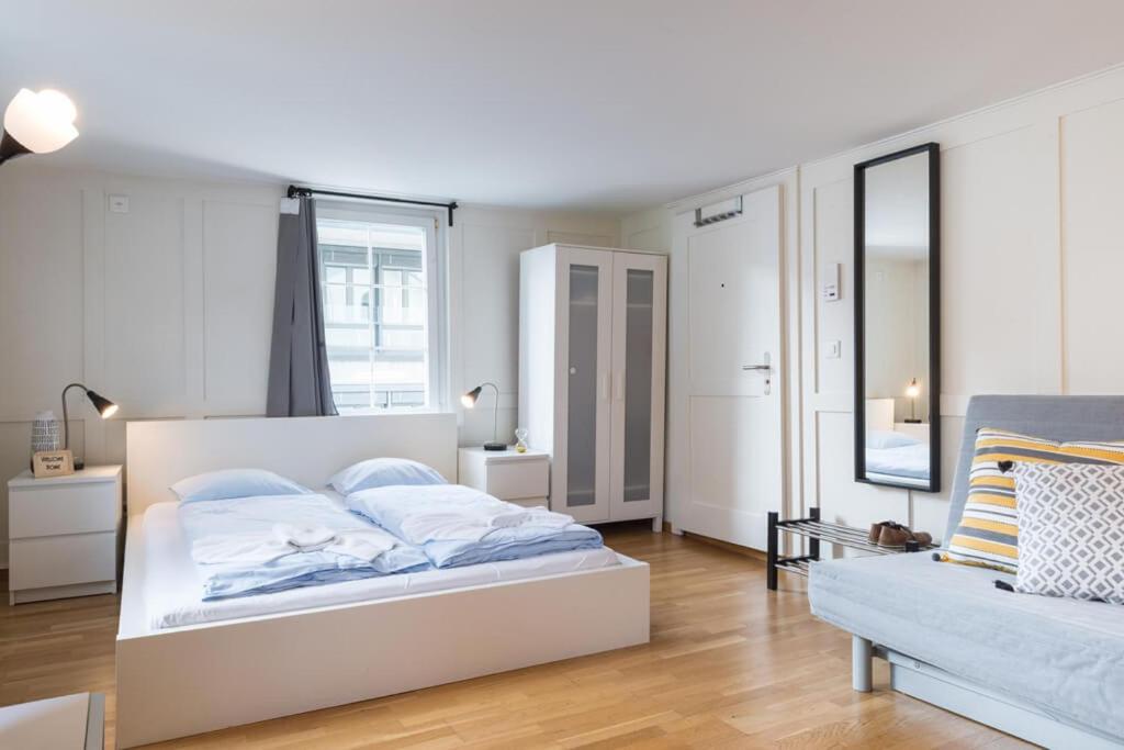 Postel nebo postele na pokoji v ubytování HITrental Zeughausgasse - Apartment