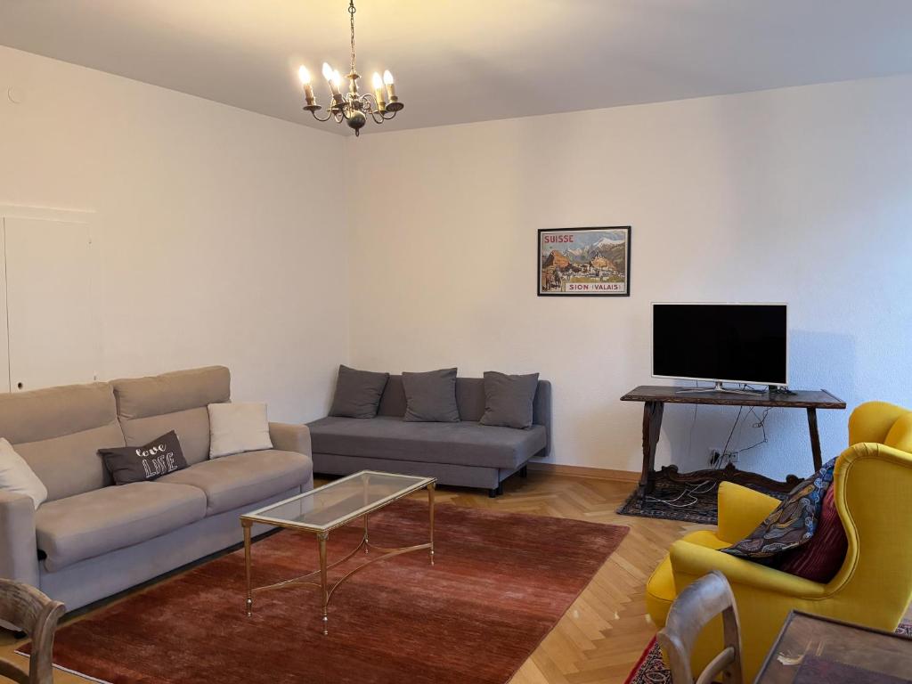 Posezení v ubytování Charmant appartement au cœur de Sion