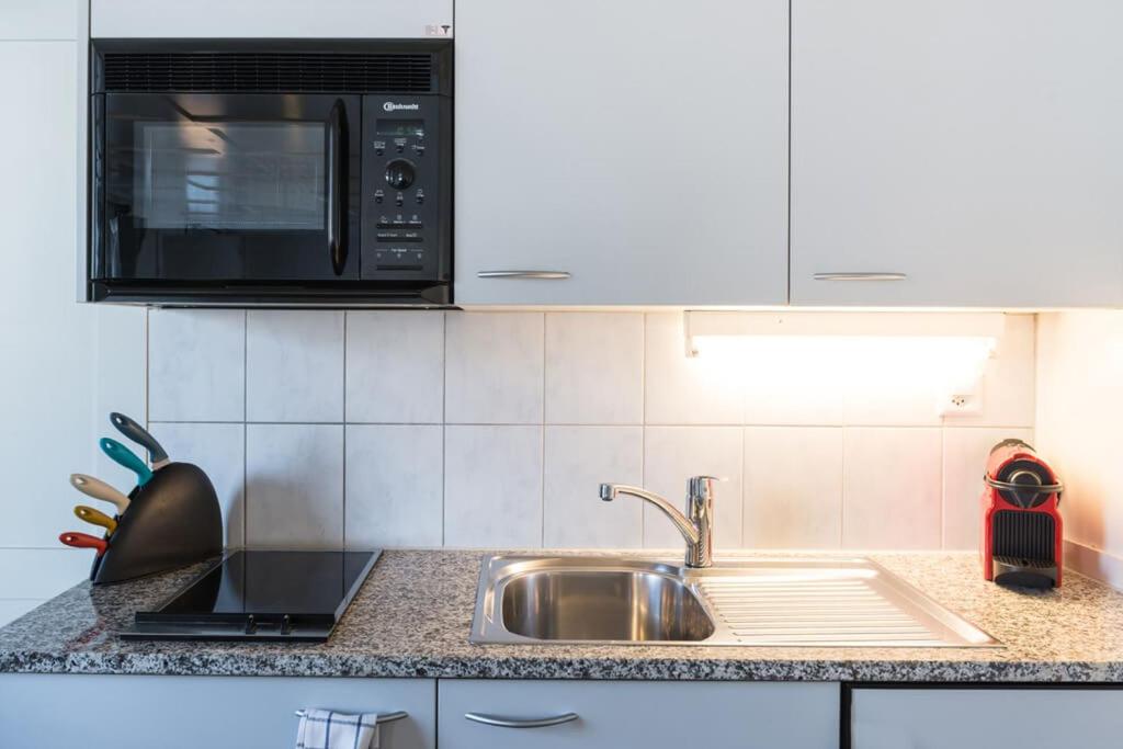 Kuchyň nebo kuchyňský kout v ubytování HITrental Zeughausgasse - Apartment