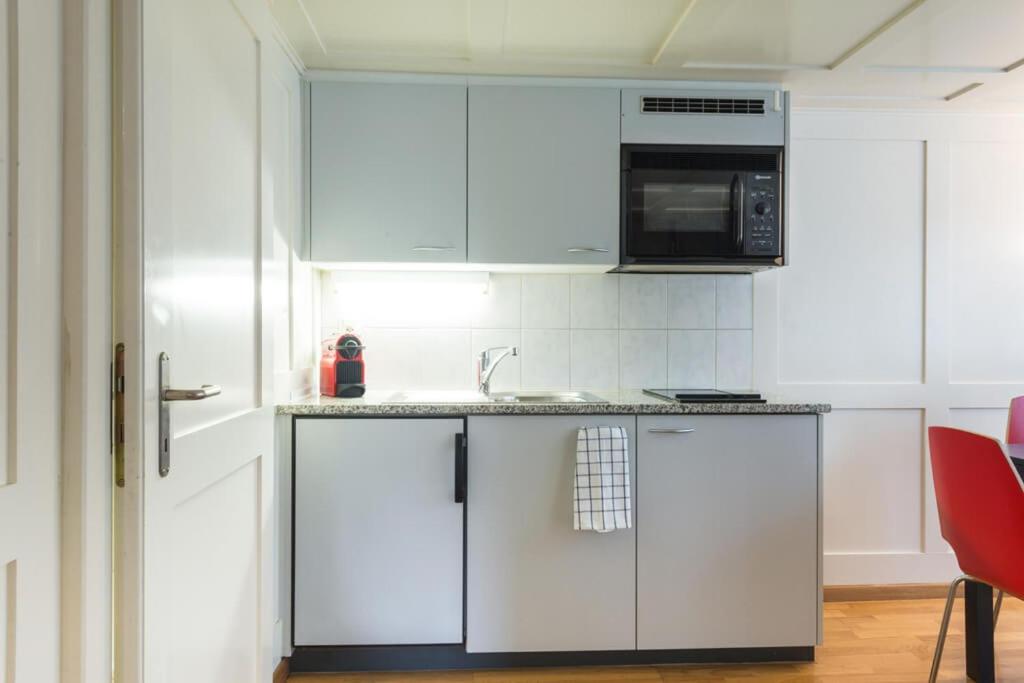 Kuchyň nebo kuchyňský kout v ubytování HITrental Zeughausgasse - Apartment