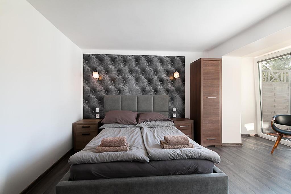 Postel nebo postele na pokoji v ubytování Villa Platinum