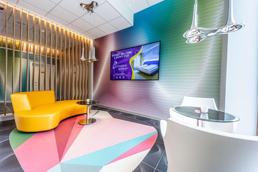 TV a/nebo společenská místnost v ubytování Prize by Radisson, Antwerp City