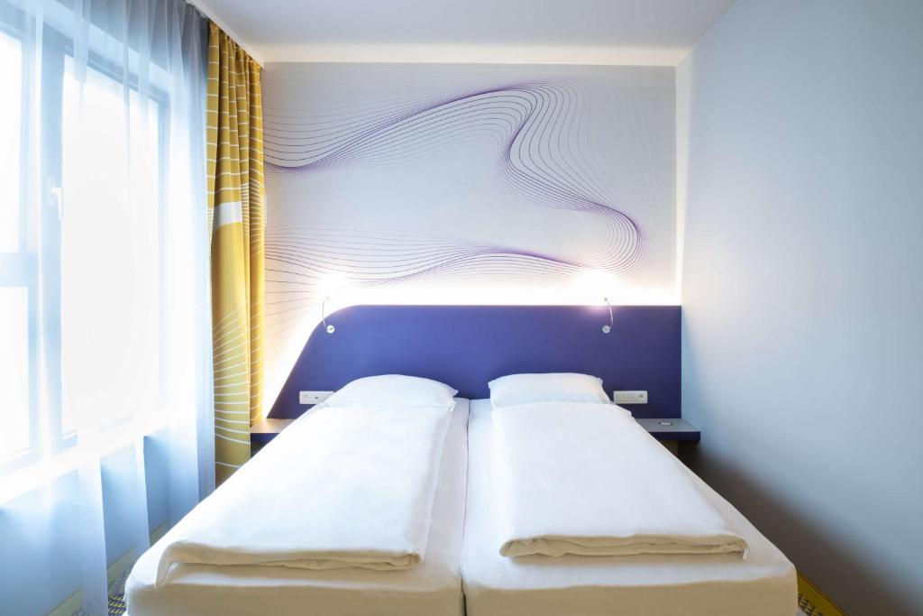 Postel nebo postele na pokoji v ubytování Prize by Radisson, Antwerp City
