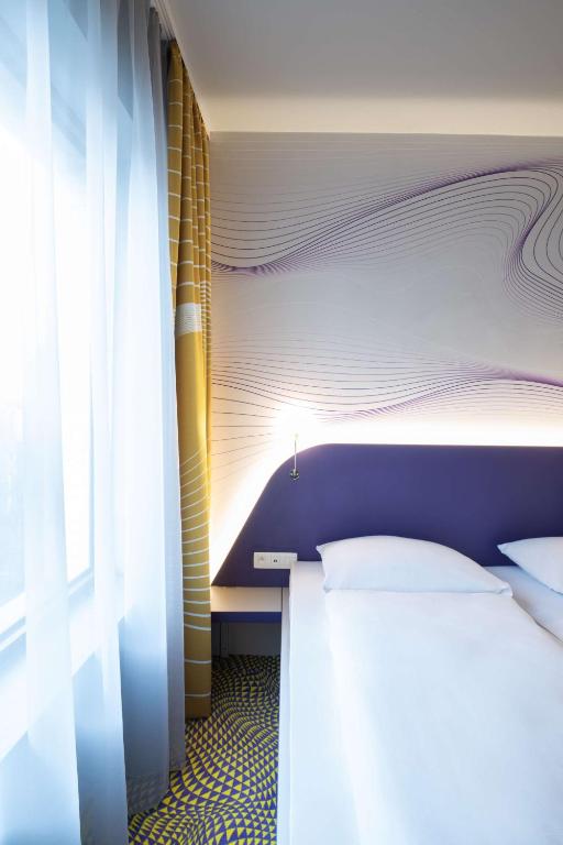 Postel nebo postele na pokoji v ubytování Prize by Radisson, Antwerp City