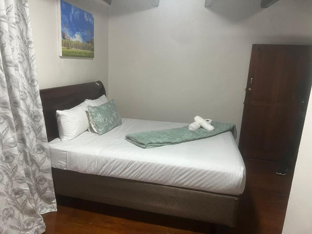 Letto o letti in una camera di Heba Guest Lodge Two