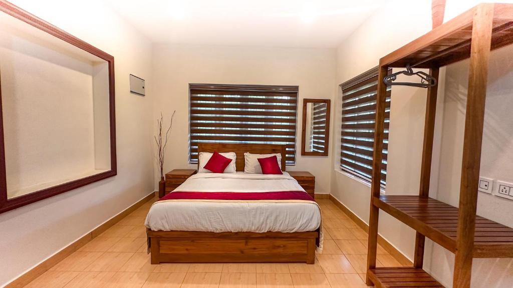 Postel nebo postele na pokoji v ubytování Janiro Tea Trees Villas