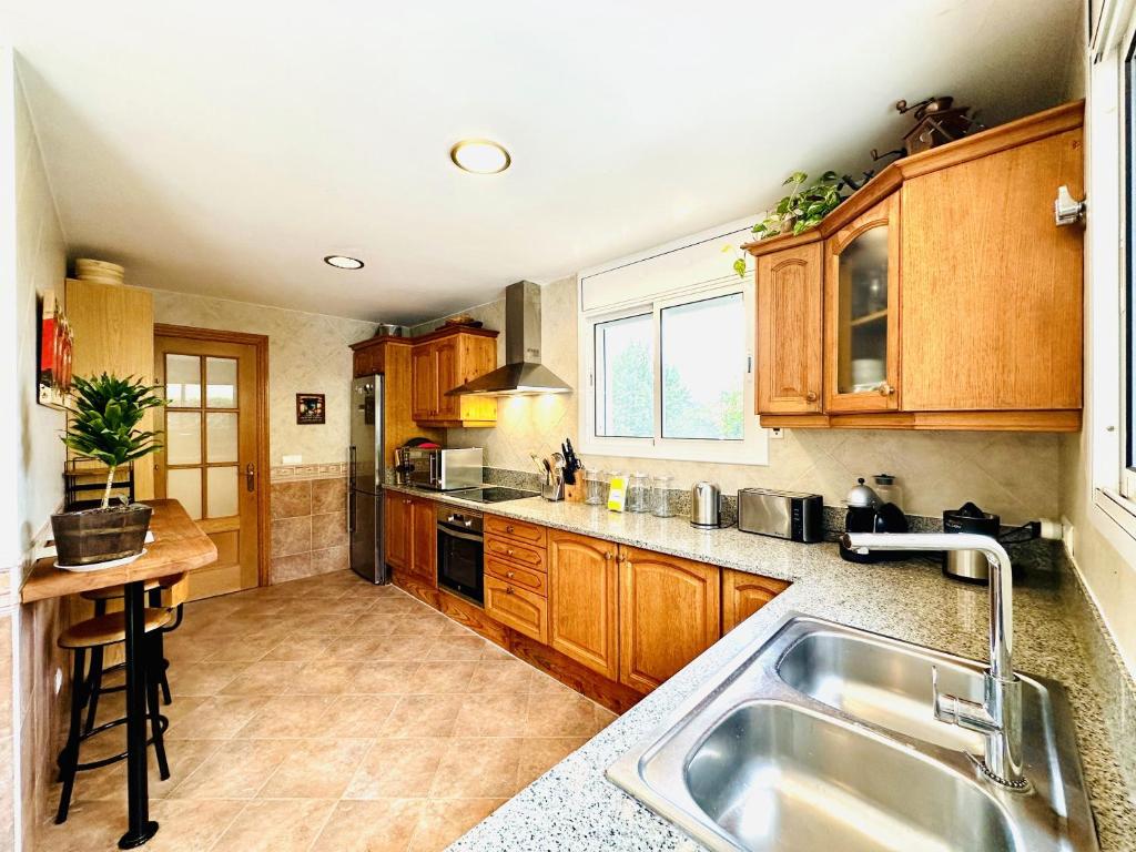 A kitchen or kitchenette at Aitana CostaBravaSi