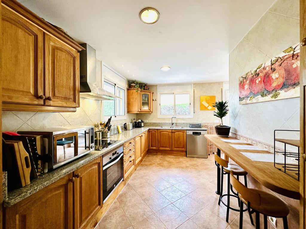 A kitchen or kitchenette at Aitana CostaBravaSi