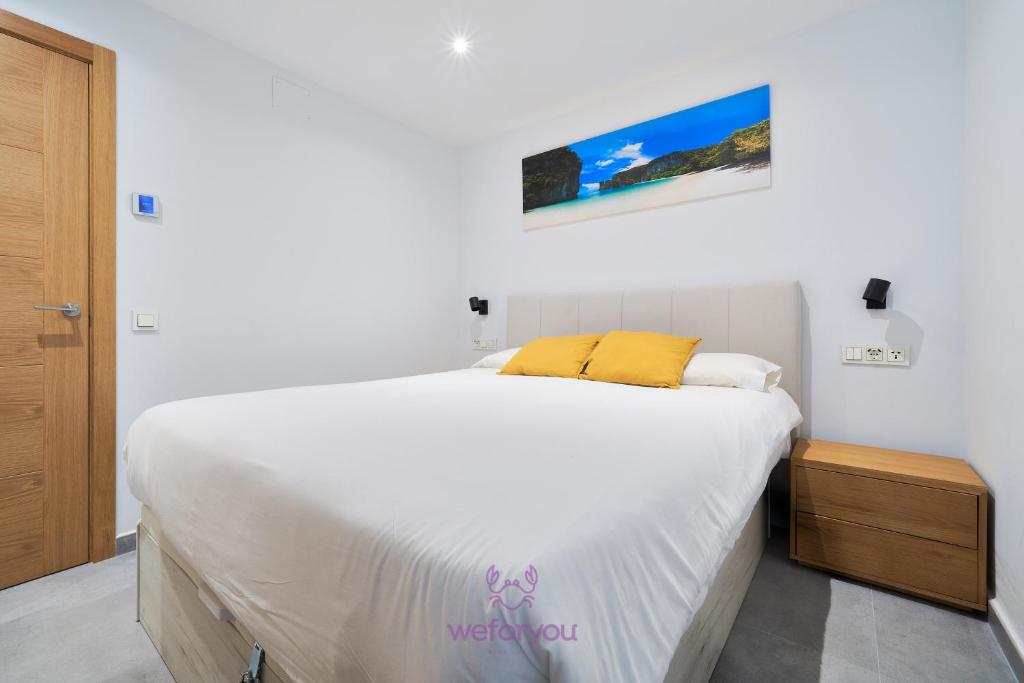 Posteľ alebo postele v izbe v ubytovaní weforyou Isla de Poniente 2 Bedrooms and Parking