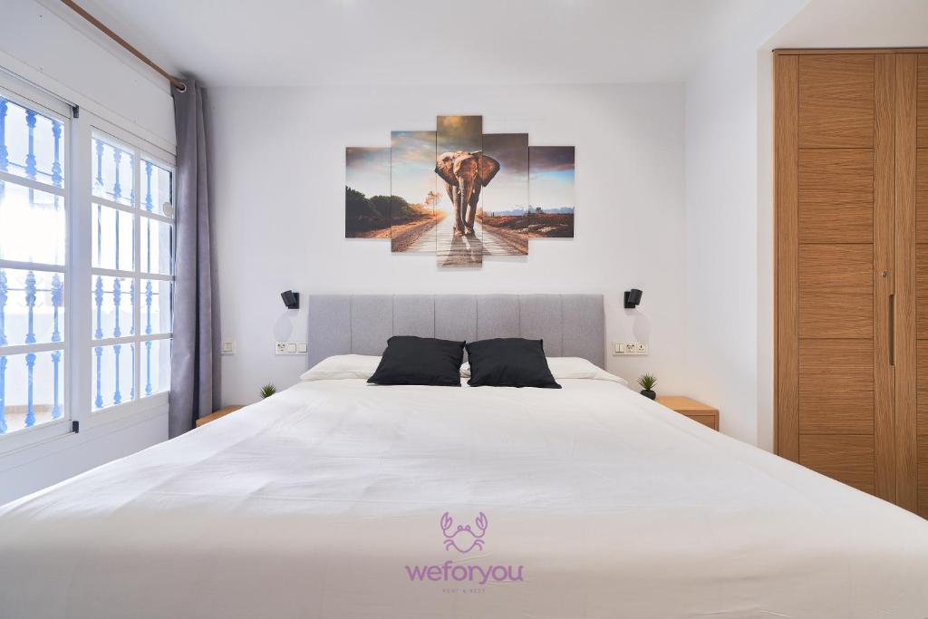 Posteľ alebo postele v izbe v ubytovaní weforyou Isla de Poniente 2 Bedrooms and Parking