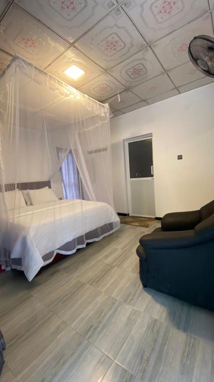 Postel nebo postele na pokoji v ubytování Cinnamon Homestay ella
