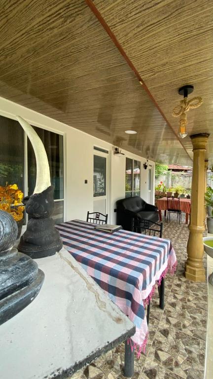 Posezení v ubytování Cinnamon Homestay ella