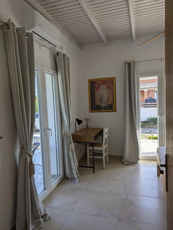 Fotografie z fotogalerie ubytování Almyros Garden House v destinaci Acharavi