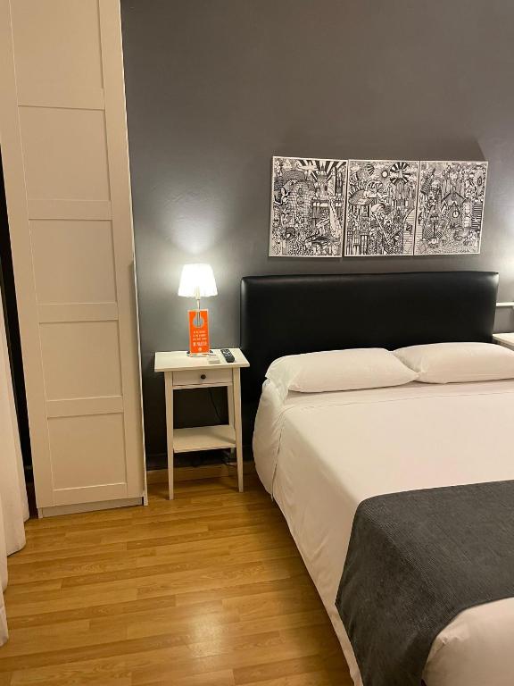 Posteľ alebo postele v izbe v ubytovaní Hostal El Ninot