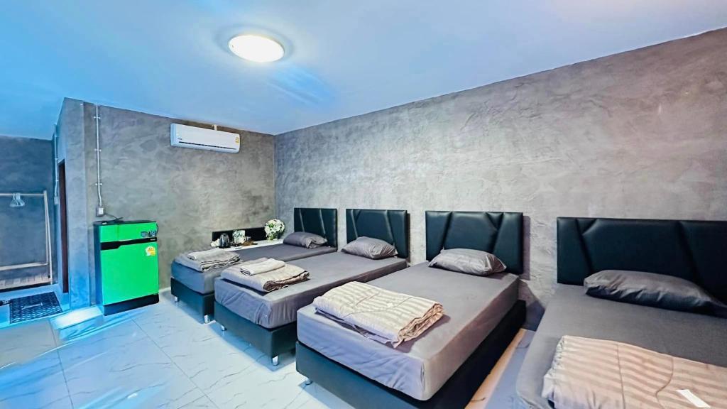 Postel nebo postele na pokoji v ubytování บ้านภทรพรรณ ขุนยวม แม่ฮ่องสอน PATARAPHAN HOUSE, Khunyuam, Maehongson, Thailand