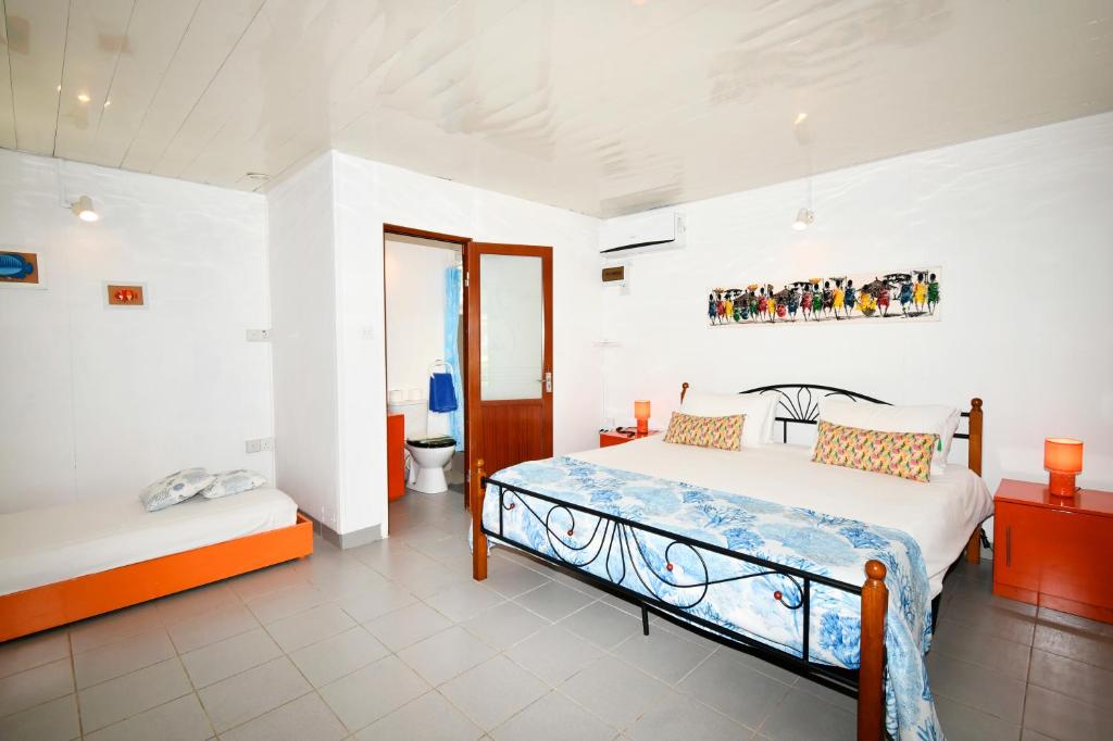 Postel nebo postele na pokoji v ubytování Chalet Cardinal
