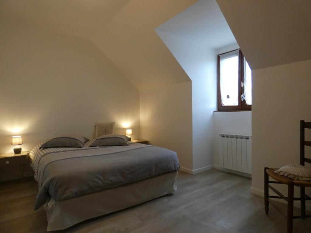 Posteľ alebo postele v izbe v ubytovaní Gîte des bords de l Eure 4 chambres 2 SDB et parking