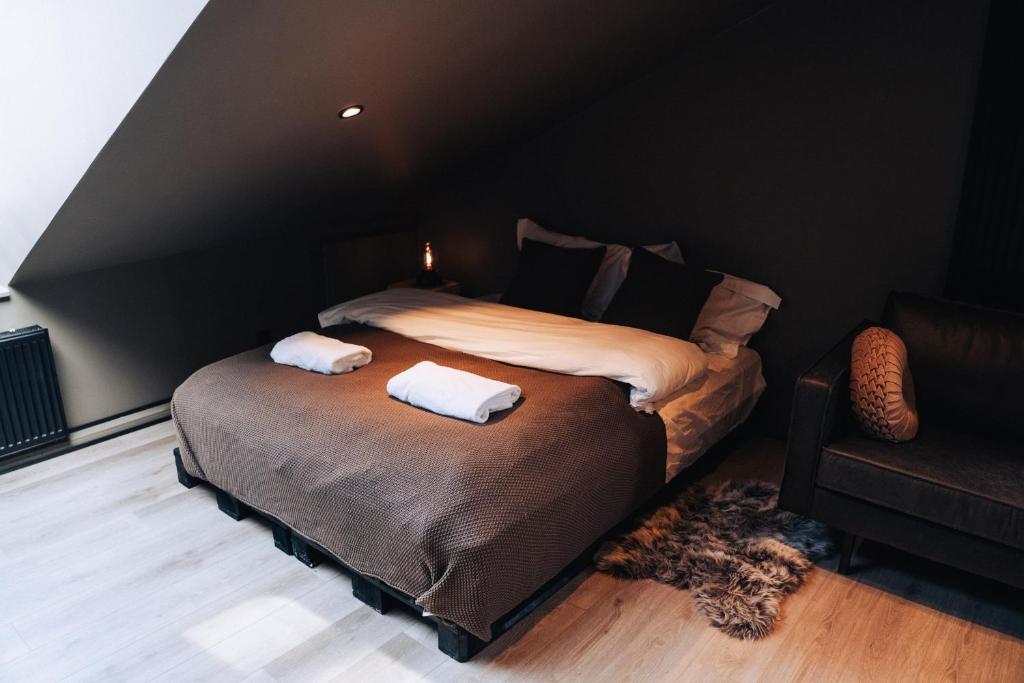 Postel nebo postele na pokoji v ubytování Keflavik Cozy Apartments