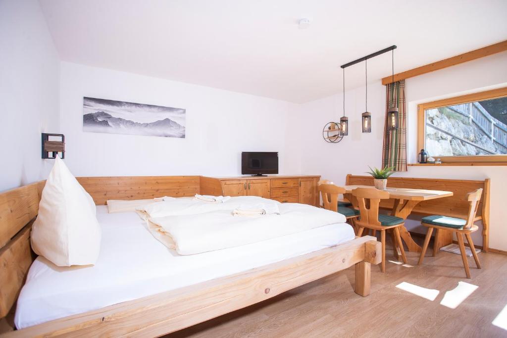 TV a/nebo společenská místnost v ubytování Alpenrelax Krepperhütte