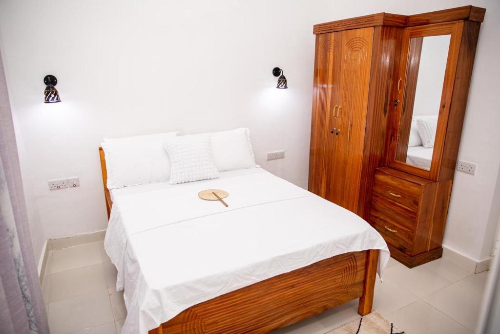 Postel nebo postele na pokoji v ubytování KKJ House