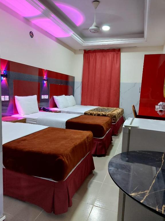 Postel nebo postele na pokoji v ubytování Saeed Hotel