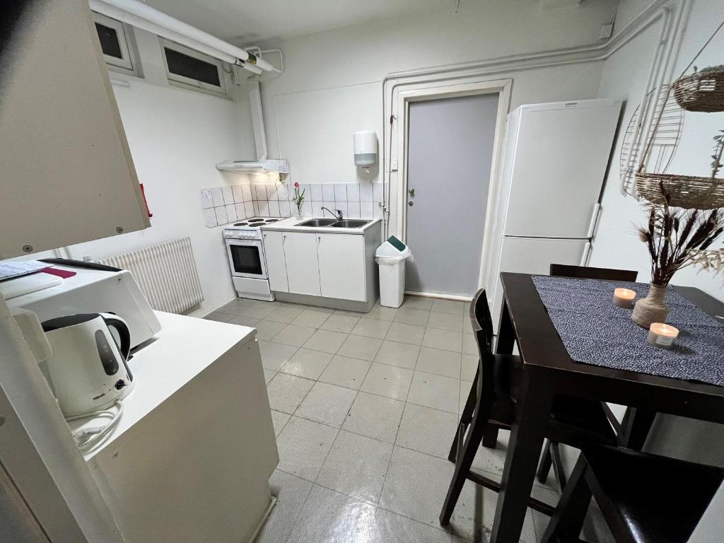 Kuchyň nebo kuchyňský kout v ubytování Hostel Oslofjord