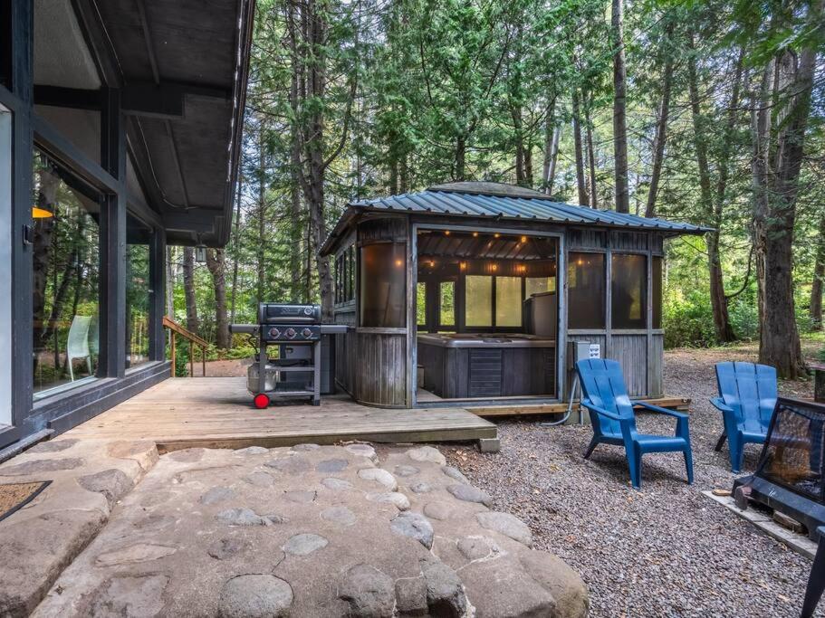 Zahrada ubytování Le1603 - Le Petit Caribou - Chalet spa et plage