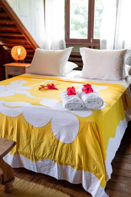 Postel nebo postele na pokoji v ubytování Chalet TEMAE