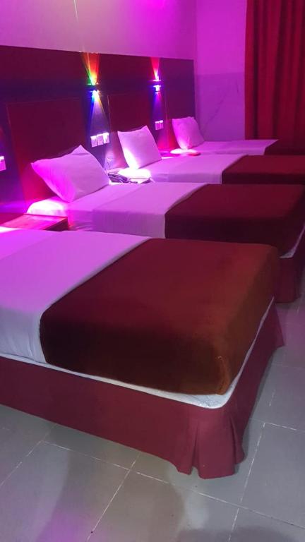 Postel nebo postele na pokoji v ubytování Saeed Hotel