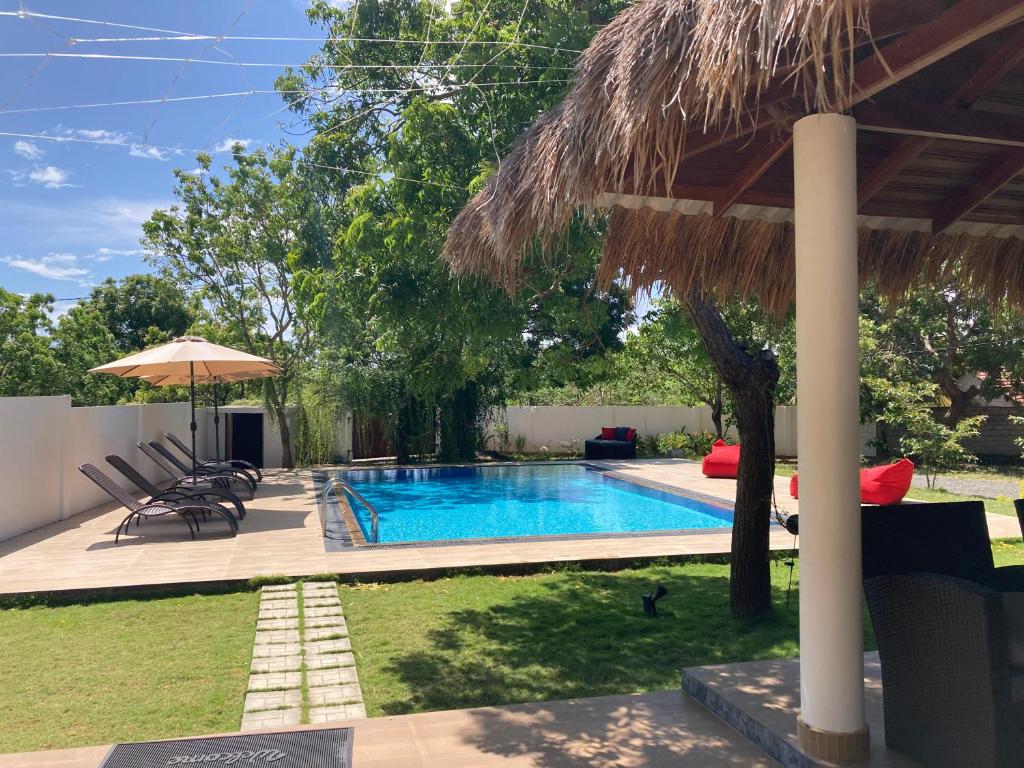 Bazén v ubytování Kirinda Paradise Yala nebo v jeho okolí