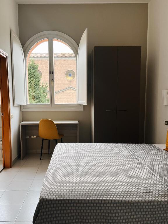 Postel nebo postele na pokoji v ubytování Al Gallo Trattoria e Locanda