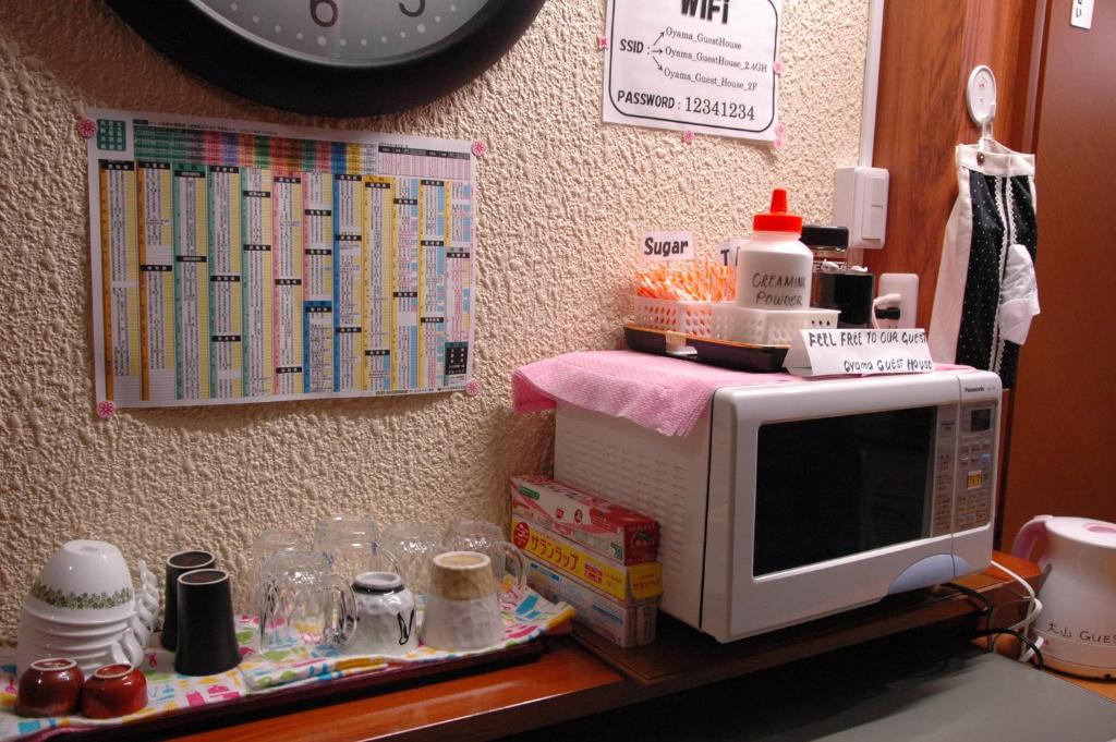 Kuchyň nebo kuchyňský kout v ubytování Oyama Guesthouse Kyoto