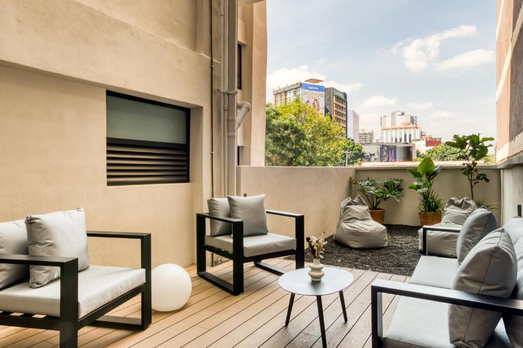 Posezení v ubytování Caliza Roma Residences by Tasman