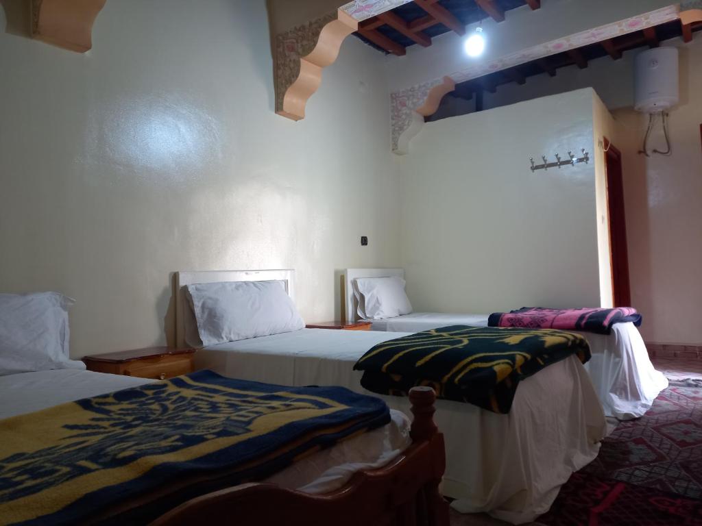 Postel nebo postele na pokoji v ubytování gîte d'étape ziz oasis