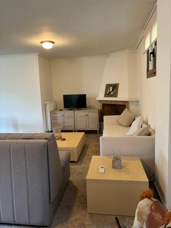 TV a/nebo společenská místnost v ubytování CASA DI MADI