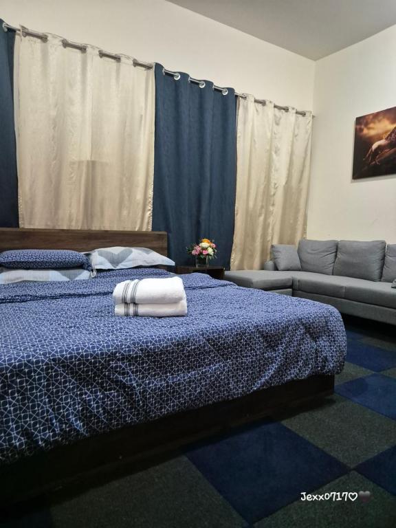 Postel nebo postele na pokoji v ubytování Ghurfati