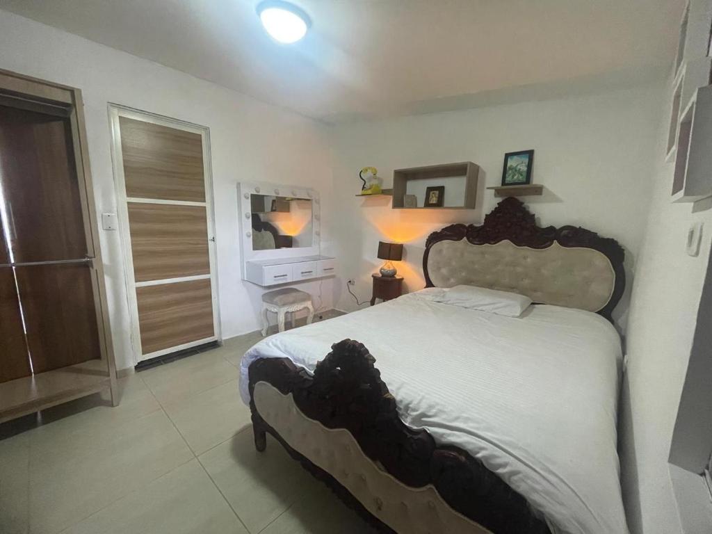 Postel nebo postele na pokoji v ubytování Casa Hostal los Profes