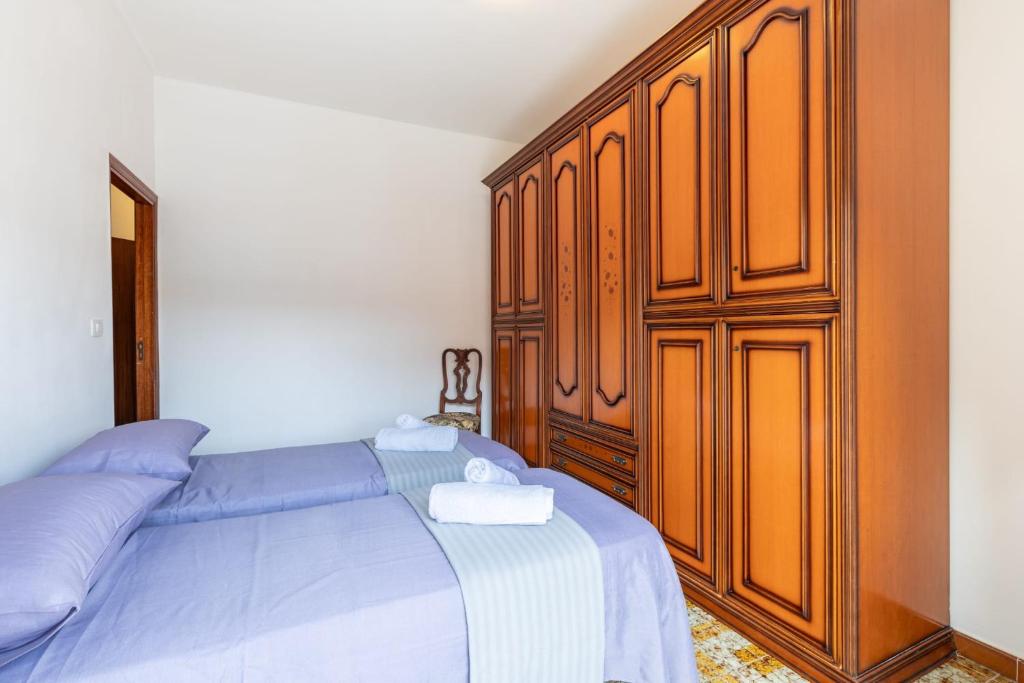 Postel nebo postele na pokoji v ubytování Casa Iblea