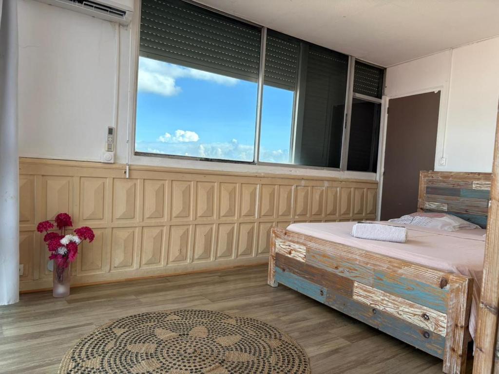 Postel nebo postele na pokoji v ubytování PENTHOUSE 10 MIN port croisière et aéroport