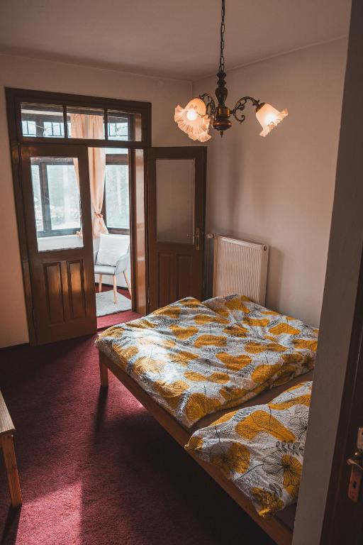 Postel nebo postele na pokoji v ubytování Vila Anobis