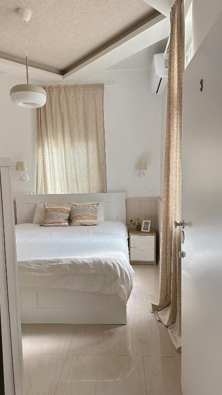 Postel nebo postele na pokoji v ubytování Dream House
