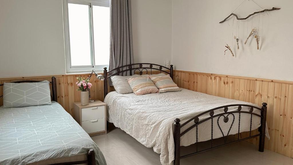 Postel nebo postele na pokoji v ubytování Dream House