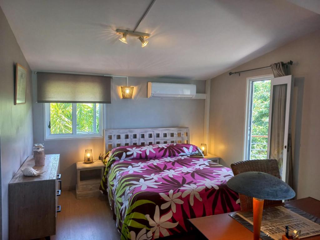 Postel nebo postele na pokoji v ubytování MARINA BLUE fabuleux Appartement vue LAGON