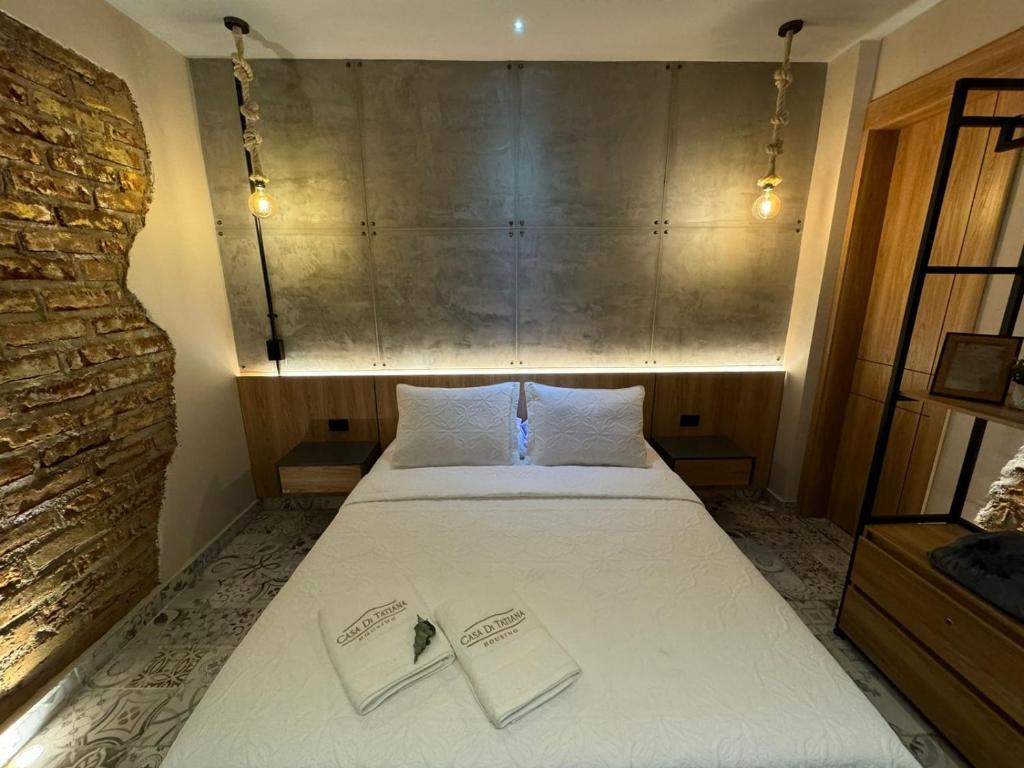 Postel nebo postele na pokoji v ubytování Casa Di Tatiana